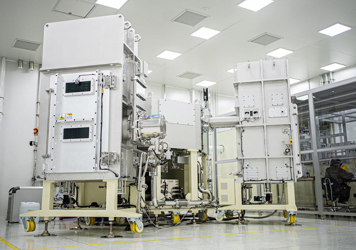 Front view of large-scale vacuum deposition system equipment