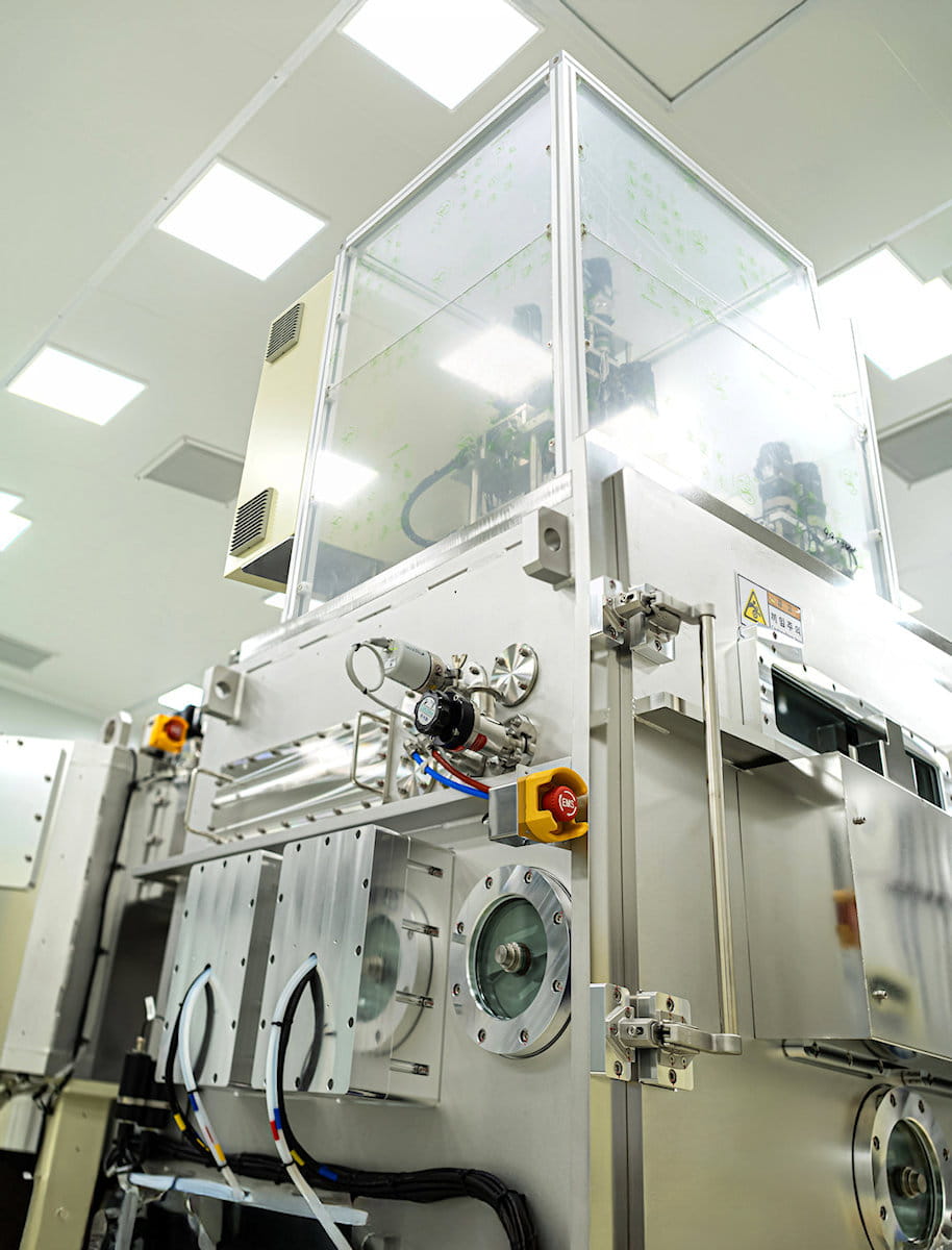 Detailed view of specialized precision deposition tool and vacuum apparatus